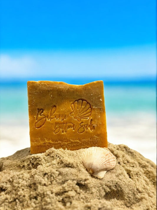 Natural exfoliating soap bar with annatto and shea butter