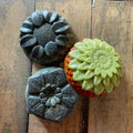 Handmade turmeric soap bar with goat milk, papaya, and hibiscus