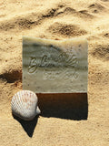 Organic oil-based soap bar with light exfoliation and earthy scent