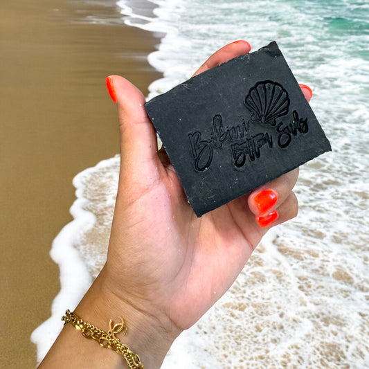 Lathering natural charcoal soap bar for deep cleansing skincare routine
