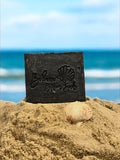 Aesthetic display of activated charcoal soap – vegan, handcrafted skincare